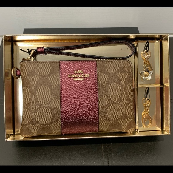 Coach Handbags - NWT Coach Wristlet & Charms Set